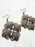 Large Antique Rose Gold Vintage Filigree Flower Earrings
Add a touch of whimsy with our Vintage Filigree Earrings. These lightweight beauties feature intricate filigree designs for a boho vibe. Perfect for a playful and carefree look.
Lightweight brass metal stampings with a rose gold patina.
70mm from the top of the ear hook x 57mm