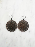 Large Antique Rose Gold Vintage Filigree Mandala Earrings.
Add a touch of whimsy with our Vintage Filigree Earrings. These lightweight beauties feature intricate filigree designs for a boho vibe. Perfect for a playful and carefree look.
Lightweight brass metal stampings with a rose gold patina.
55mm from the top of the ear hook x 44mm