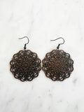 Large Antique Rose Gold Vintage Filigree Mandala Earrings.
Add a touch of whimsy with our Vintage Filigree Earrings. These lightweight beauties feature intricate filigree designs for a boho vibe. Perfect for a playful and carefree look.
Lightweight brass metal stampings with a rose gold patina.
55mm from the top of the ear hook x 44mm