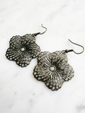 Antique Bronze Vintage Filigree Geometric Flower Earrings
Add a touch of whimsy with our Vintage Filigree Earrings. These lightweight beauties feature intricate filigree designs for a boho vibe. Perfect for a playful and carefree look.
Lightweight brass metal stampings with an antique bronze patina.
51mm from the top of the ear hook x 35mm