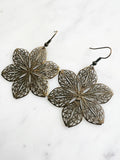 Antique Bronze Vintage Filigree Flower Earrings
Add a touch of whimsy with our Vintage Filigree Earrings. These lightweight beauties feature intricate filigree designs for a boho vibe. Perfect for a playful and carefree look.
Lightweight brass metal stampings with an antique bronze patina.
60mm from the top of the ear hook x 43mm