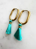 Add a pop of fun to your look with these vibrant Turquoise Tassel Oval Hoop Earrings! Featuring playful tassels, these lightweight hoops are perfect for bringing a splash of personality to any outfit. Whether you’re dressing up for a party or adding flair to your everyday style, these earrings are a cheerful statement that’s impossible to ignore! 
20mm Oval Hoop Huggies - Surgical Stainless Steel base plated with rhodium for a shiny finish.
Suitable for sensitive ears. Easy click open and shut mechanis