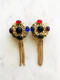 Wow your friends with these unique Vintage Retro Glass Bead Earrings! They'll be sure to provide an eye-catching sparkle to any look - no piercing required! Never boring and always sure to turn heads with these voguish, retro-chic earrings. Hop on the vintage bandwagon today!  Gold Plated   Clip On Earrings  70mm x 30mm