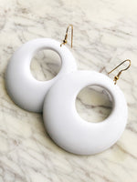 Rock out with these retro-style Vintage Rockabilly White Milk Bar Hoops! Whether you're jamming out to your favorite tunes or having a blast at a party, these earrings will add just the right touch of classic style. (Time to get your rock on!)  65mm