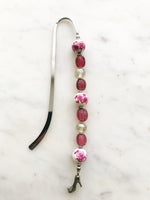 Handmade Bookmark using Vintage Bohemian Glass Beads. These bookmarks are hand made by me using vintage beads from broken or mismatched necklaces and earrings. Each bookmark is unique and carefully crafted to have a vintage feel and look. 16cm long