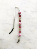 Handmade Bookmark using Vintage Bohemian Glass Beads. These bookmarks are hand made by me using vintage beads from broken or mismatched necklaces and earrings. Each bookmark is unique and carefully crafted to have a vintage feel and look. 16cm long