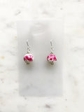 Rock these vintage pink porcelain bead earrings, handmade with care using unique and rare vintage beads. Add a touch of quirkiness to your outfit with these one-of-a-kind earrings. Silver plated 30mm x 12mm