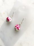 Rock these vintage pink porcelain bead earrings, handmade with care using unique and rare vintage beads. Add a touch of quirkiness to your outfit with these one-of-a-kind earrings. Silver plated 30mm x 12mm