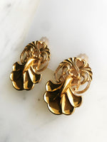 Rock a retro look with these one-of-a-kind Vintage Clip-on Earrings. These beauties are sure to give any outfit a pop of pizzazz. Get ready to bring the funk to any event with this timeless set!  Gold Plated  Clip On   40mm x 25mm