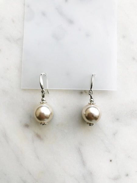 Vintage Pear drop earrings. Achieve a classic style with a twist! Handmade by me and crafted with love from a broken vintage strand of pearls. A timeless style with the perfect hint of classic flair.  Silver Plated  35mm x 15mm