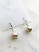 Vintage Pear drop earrings. Achieve a classic style with a twist! Handmade by me and crafted with love from a broken vintage strand of pearls. A timeless style with the perfect hint of classic flair.  Silver Plated  35mm x 15mm