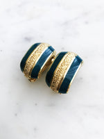 Look super stylish while rocking these vintage retro enamel clip-on earrings! Perfect for adding a bit of 'oomph' to any outfit or occasion. With a hint of playful fun, these earrings are sure to draw attention wherever you go!  Clip On Earrings  Gold Plated  26mm x 15mm