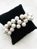 Say bye-bye to boring accessories! This Vintage Glass Pearl Bracelet adds a one-of-a-kind shimmer to your look. Glam up your wrist with this unique piece – there’s no chance you’ll blend into the background.  Vintage Glass Pearls 10mm  One size fits all adjustable bracelet