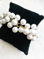 Say bye-bye to boring accessories! This Vintage Glass Pearl Bracelet adds a one-of-a-kind shimmer to your look. Glam up your wrist with this unique piece – there’s no chance you’ll blend into the background.  Vintage Glass Pearls 10mm  One size fits all adjustable bracelet