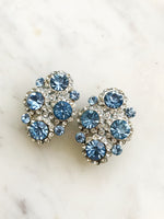 Get ready to rock that vintage vibe with our Vintage Light Blue Crystal Clip-on Earrings! These beauties are like a breath of fresh air for your ears – stylish, fun, and oh-so-easy to wear. Clip 'em on, and let the cool, retro charm take you back to a time when fashion was all about flair! 💎💙✨  Vintage Crystal  Silver Plated  Clip on Earrings  43mm x 26mm