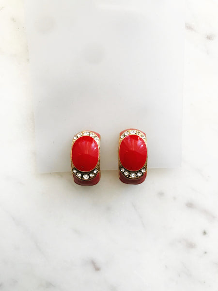 Glam-up your look with these sparkling Red Enamel Half Huggie Clip On Earrings. Boasting an eye-catching design, these huggie earrings will take your outfit to the next level! Make the ordinary extraordinary and add a touch of glamour to your day. Woot woot!  Gold Plated  Clip On   21mm x 11mm