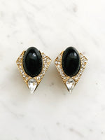 Elevate your ensembles with these Vintage Retro Art Deco Crystal Clip on Earrings! These gorgeous pieces will add a timeless look with a hint of sparkle. Look no further for statement-making style that looks like a million bucks (without spending one!).  Clip On Earrings  Gold Plated  40mm x 30mm