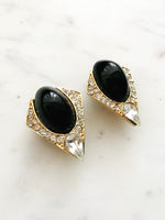 Elevate your ensembles with these Vintage Retro Art Deco Crystal Clip on Earrings! These gorgeous pieces will add a timeless look with a hint of sparkle. Look no further for statement-making style that looks like a million bucks (without spending one!).  Clip On Earrings  Gold Plated  40mm x 30mm