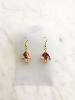 Look classy and vogue in these one-of-a-kind Vintage Navette Crystal Earrings! These earrings are great for adding a hint of sparkle and flair to a night out, making you the belle of the ball. Get ready to twinkle!  Vintage Crystal Earrings  Gold Plated  Nickel free ear hooks for sensitive skin  40mm x 18mm