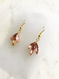 Look classy and vogue in these one-of-a-kind Vintage Navette Crystal Earrings! These earrings are great for adding a hint of sparkle and flair to a night out, making you the belle of the ball. Get ready to twinkle!  Vintage Crystal Earrings  Gold Plated  Nickel free ear hooks for sensitive skin  40mm x 18mm