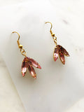 Look classy and vogue in these one-of-a-kind Vintage Navette Crystal Earrings! These earrings are great for adding a hint of sparkle and flair to a night out, making you the belle of the ball. Get ready to twinkle!  Vintage Crystal Earrings  Gold Plated  Nickel free ear hooks for sensitive skin  40mm x 18mm