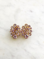 Add a sparkle of vintage glamour with these dazzling Blush clip-on earrings! With plenty of sparkle and shine, these earrings are perfect for adding a touch of old-school class to any outfit! Gold Plated Clip on Earrings 37mm x 27mm