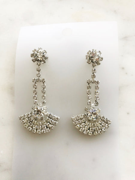 These Vintage Diamante Crystal Art Deco Earrings will make you shine like a diamond! With a glamorous art deco-inspired style, they're perfect for adding a hint of Hollywood glam to any ensemble. Sparkle on, fashionista!  Silver Plated Crystal earrings  50mm x 25mm