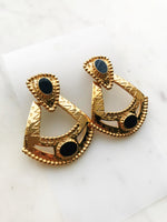 Step into a world of whimsy and charm with our vintage enamel earrings! These delightful beauties are like bursts of joy for your ears. Adorned with vibrant Navy enamel and intricate patterns, they'll add a playful touch to any outfit. Get ready to twirl, dance, and make a statement with these vintage-inspired treasures!  Gold Plated  47mm x 40mm