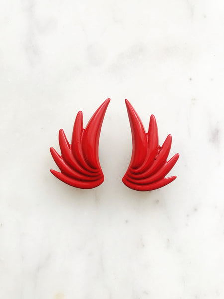 These Retro Red Clip-on Earrings are sassy, stylish, and sure to make a statement! A classic look that's bold and classy (with a hint of sass). Clip them on and get ready to show the world your retro chic!  35mm x 20mm
