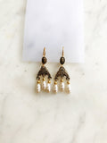 Lovingly crafted from a broken vintage necklace, these earrings combine sleek sophistication with eclectic, bohemian charm, making them the perfect accessory to keep you looking both timeless and stylish.  Gold Plated  45mm x 15mm   