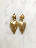 Add a touch of vintage sass to your style with these Retro Clip-on Earrings. The perfect statement piece for any outfit, these earrings are a fashion-forward choice without the hassle of piercing. Embrace the past and stand out from the crowd with these one-of-a-kind earrings.  Clip On Earrings. Light weight.  Gold Plated  85mm x 45mm