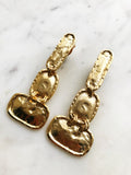 Add some shine to your style with these quirky Gold Link Clip on Earrings. These earrings are perfect for those who don't have their ears pierced and want a unique accessory. Their gold color adds a touch of elegance, making them perfect for any occasion.  Clip-on  Gold plated  70mm x 30mm