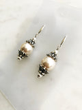 Vintage Glass Pearl Earrings Achieve a classic style with a twist! Handmade by me and crafted with love from a broken vintage strand of pearls. A timeless style with the perfect hint of classic flair. Silver plated. 45mm x 12mm