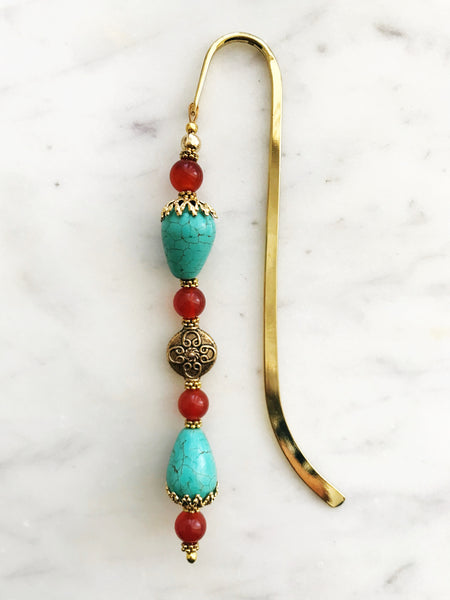 Handmade Bookmark Turquoise Howlite & Carnelian.  Each bookmark is unique and carefully crafted to have a vintage feel and look. Crystals from top down Carnelian Turquoise Howlite Carnelian Carnelian Turquoise Howlite 13cm long
