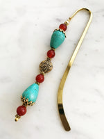 Handmade Bookmark Turquoise Howlite & Carnelian.  Each bookmark is unique and carefully crafted to have a vintage feel and look. Crystals from top down Carnelian Turquoise Howlite Carnelian Carnelian Turquoise Howlite 13cm long