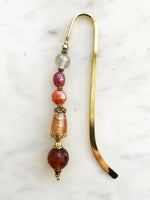 These bookmarks are handmade using vintage beads from broken or mismatched necklaces and earrings.
Each bookmark is unique and carefully crafted to have a vintage feel and look.
12.5cm long