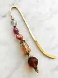 These bookmarks are handmade using vintage beads from broken or mismatched necklaces and earrings.
Each bookmark is unique and carefully crafted to have a vintage feel and look.
12.5cm long