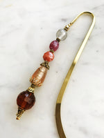 These bookmarks are handmade using vintage beads from broken or mismatched necklaces and earrings.
Each bookmark is unique and carefully crafted to have a vintage feel and look.
12.5cm long