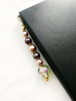 Handmade Bookmark using Vintage Bohemian Glass &amp; Pearl Beads.  These bookmarks are handmade using vintage beads from broken or mismatched necklaces and earrings.  Each bookmark is unique and carefully crafted to have a vintage feel and look.  9cm long.