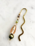 Handmade Bookmark using Vintage Bohemian Glass Beads.  These bookmarks are handmade using vintage beads from broken or mismatched necklaces and earrings.  Each bookmark is unique and carefully crafted to have a vintage feel and look.  9cm long.