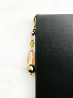 Handmade Bookmark using Vintage Bohemian Glass Beads.  These bookmarks are handmade using vintage beads from broken or mismatched necklaces and earrings.  Each bookmark is unique and carefully crafted to have a vintage feel and look.  9cm long.