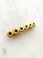 Add a touch of vintage charm to your hairstyle with our Vintage Gold and Enamel Barrette! This elegant barrette features a stunning gold design with intricate enamel detailing. Perfect for adding a unique, playful touch to any look.  58mm x 10mm