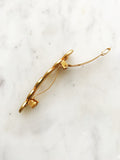 Add a touch of vintage charm to your hairstyle with our Vintage Gold and Enamel Barrette! This elegant barrette features a stunning gold design with intricate enamel detailing. Perfect for adding a unique, playful touch to any look.  58mm x 10mm