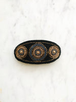 Add some vintage charm to your hair with this hand-crafted seed bead barrette. Made in France, it's a unique and stylish accessory that will elevate any hairstyle. Perfect for adding a touch of playfulness to your look!  Made by hand in France  113mm x 58mm