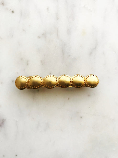 Upgrade your hair game with this stylish Vintage Gold Barrette. This barrette adds a touch of vintage charm to any hairstyle. Elevate your look effortlessly with this unique accessory!  58mm x 10mm