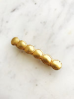 Upgrade your hair game with this stylish Vintage Gold Barrette. This barrette adds a touch of vintage charm to any hairstyle. Elevate your look effortlessly with this unique accessory!  58mm x 10mm