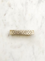 Add a touch of Celtic charm to your hairstyle with our Vintage Celtic Hair Barrette. Made with old-world flair, this barrette is perfect for adding a unique and playful flair to your look. Securely hold your hair in place with this stylish and quirky accessory.  74mm x 15mm