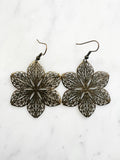 Antique Bronze Vintage Filigree Flower Earrings
Add a touch of whimsy with our Vintage Filigree Earrings. These lightweight beauties feature intricate filigree designs for a boho vibe. Perfect for a playful and carefree look.
Lightweight brass metal stampings with an antique bronze patina.
60mm from the top of the ear hook x 43mm