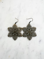 Antique Bronze Vintage Filigree Flower Earrings
Add a touch of whimsy with our Vintage Filigree Earrings. These lightweight beauties feature intricate filigree designs for a boho vibe. Perfect for a playful and carefree look.
Lightweight brass metal stampings with an antique bronze patina.
60mm from the top of the ear hook x 43mm