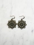 Antique Bronze Vintage Filigree Star Mandala Earrings
Add a touch of whimsy with our Vintage Filigree Earrings. These lightweight beauties feature intricate filigree designs for a boho vibe. Perfect for a playful and carefree look.
Lightweight brass metal stampings with an antique bronze patina.
43mm from the top of the ear hook x 30mm